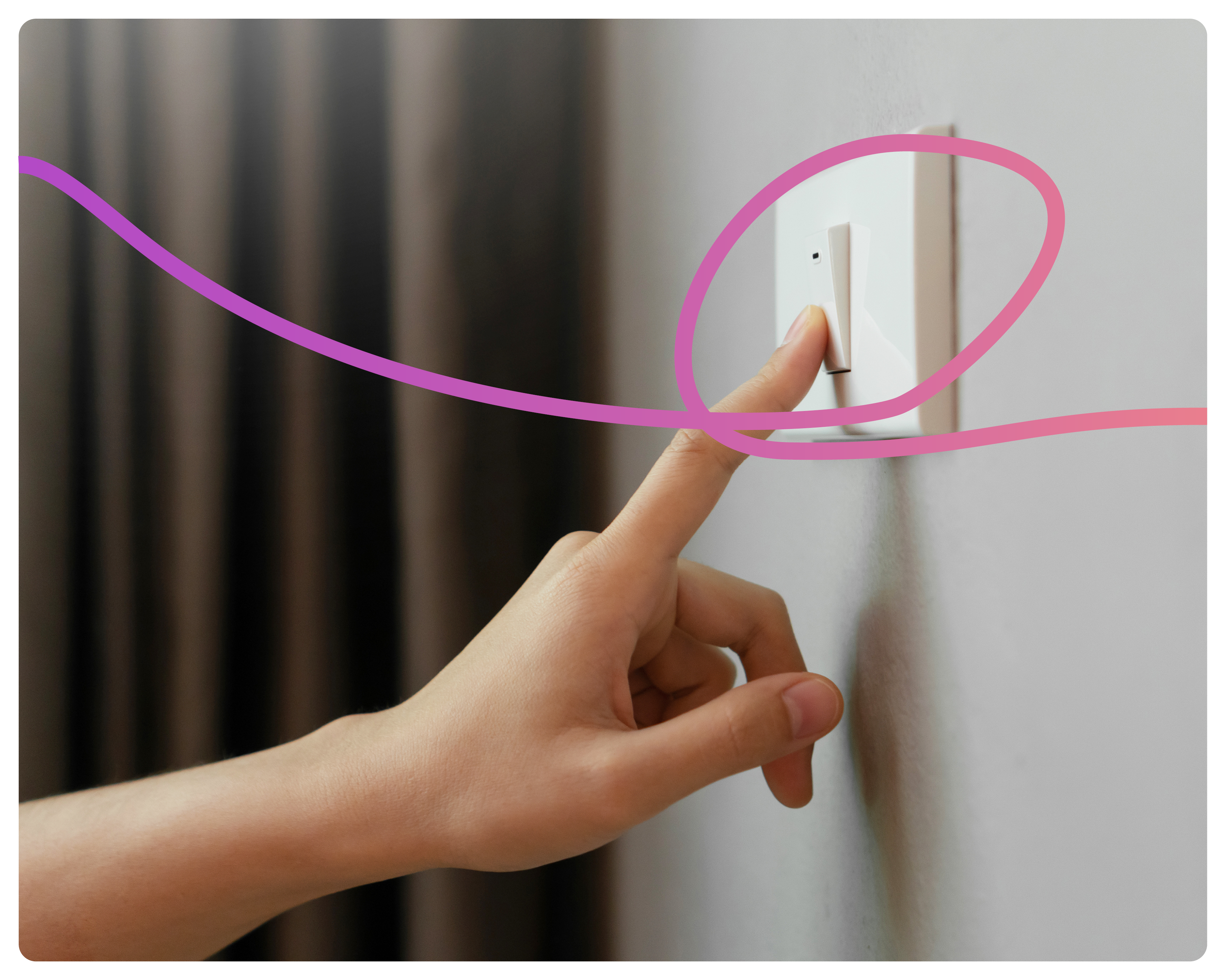 A close-up image of a hand turning off the light