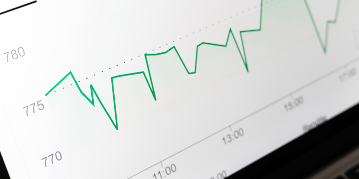 A white screen with a green line graph