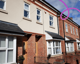 A close-up of terrace houses with a connecting line.