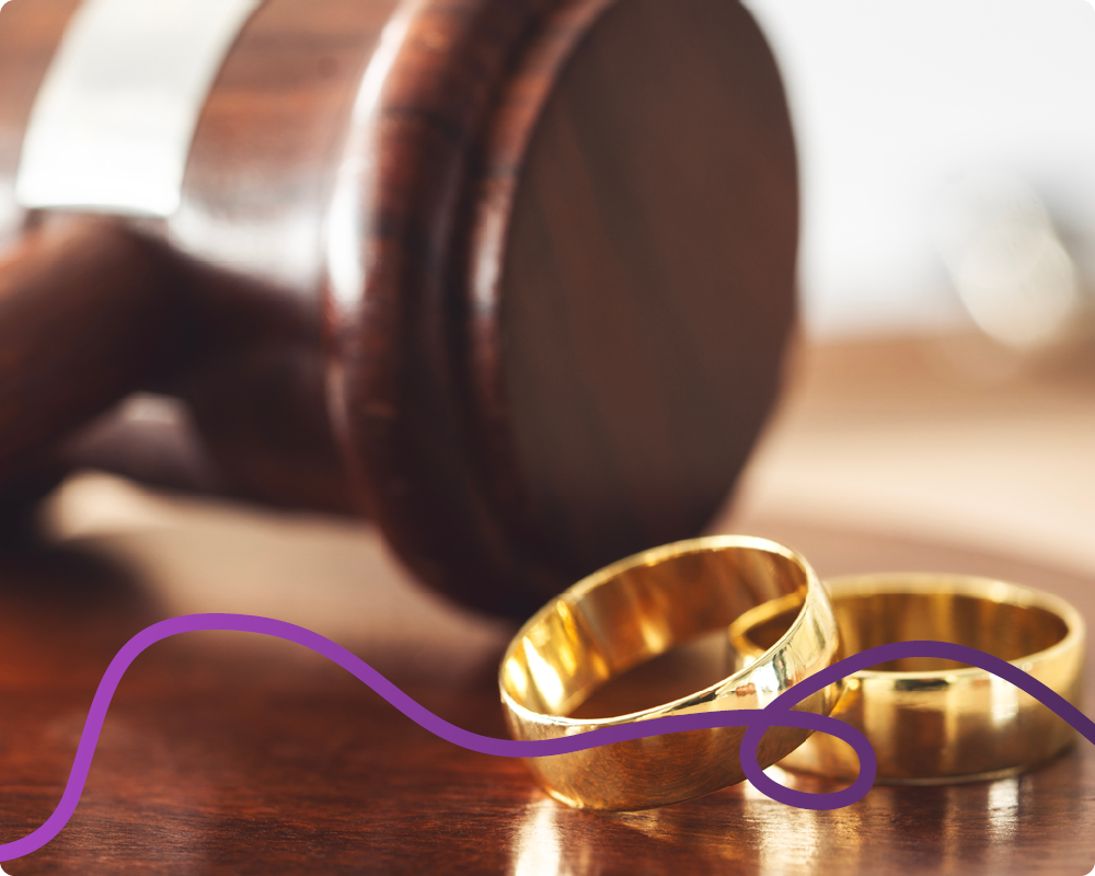 Image of two wedding rings and a gavel in the background with a purple connecting line.