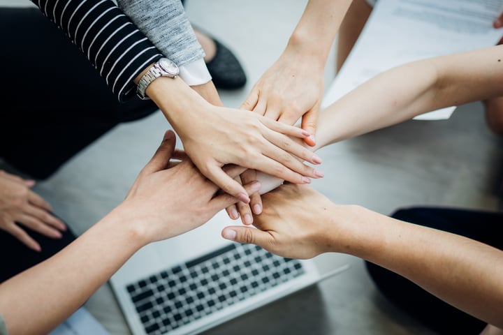 Women's hands together
