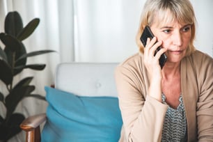 middle-aged-woman-waiting-on-the-phone